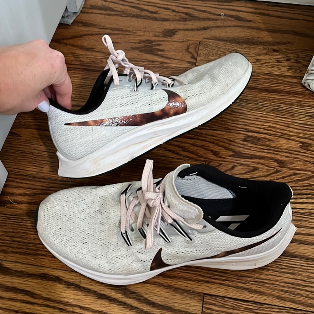 Nike running shoes, pink and tortoise